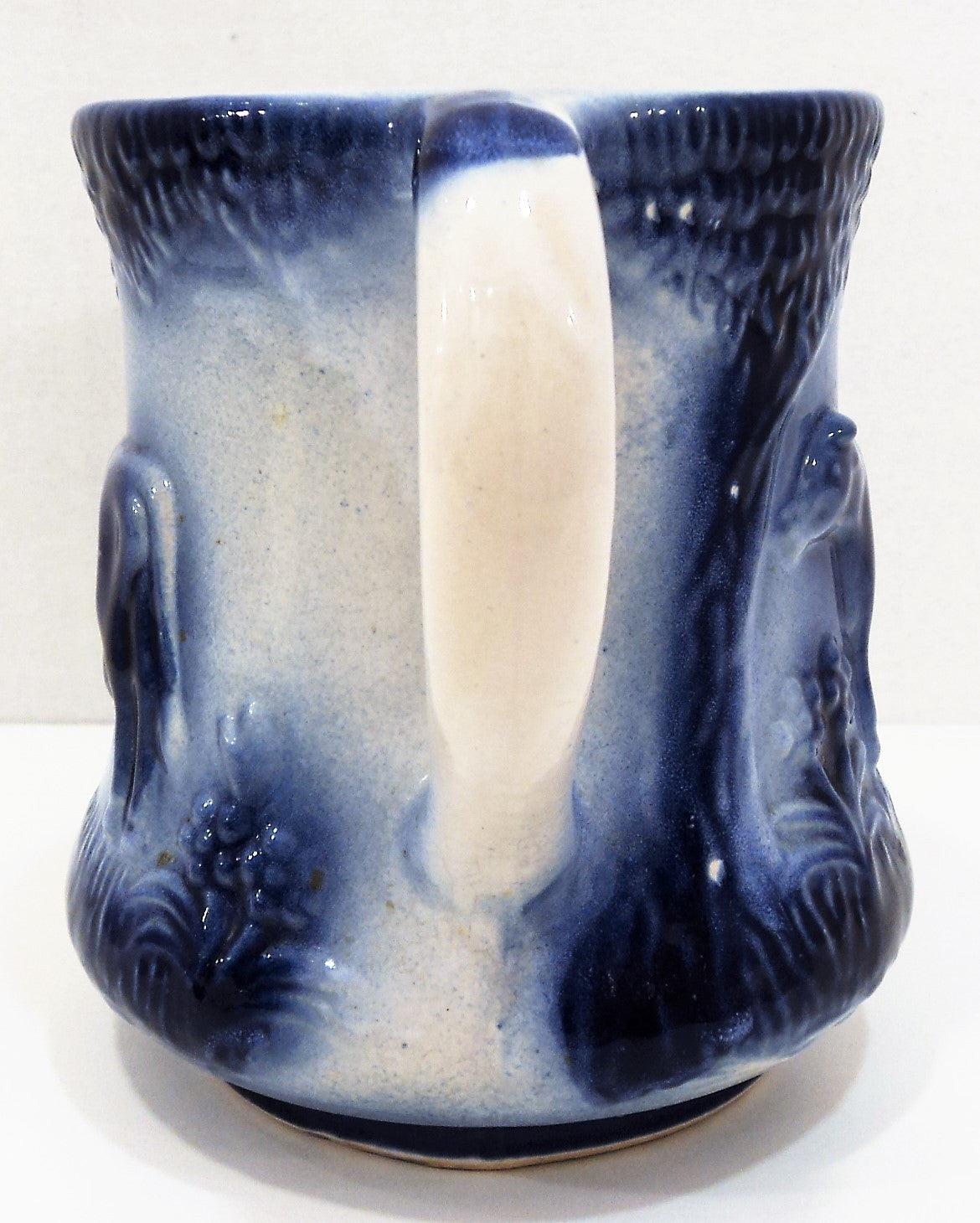 Flow Blue Pottery Pitcher