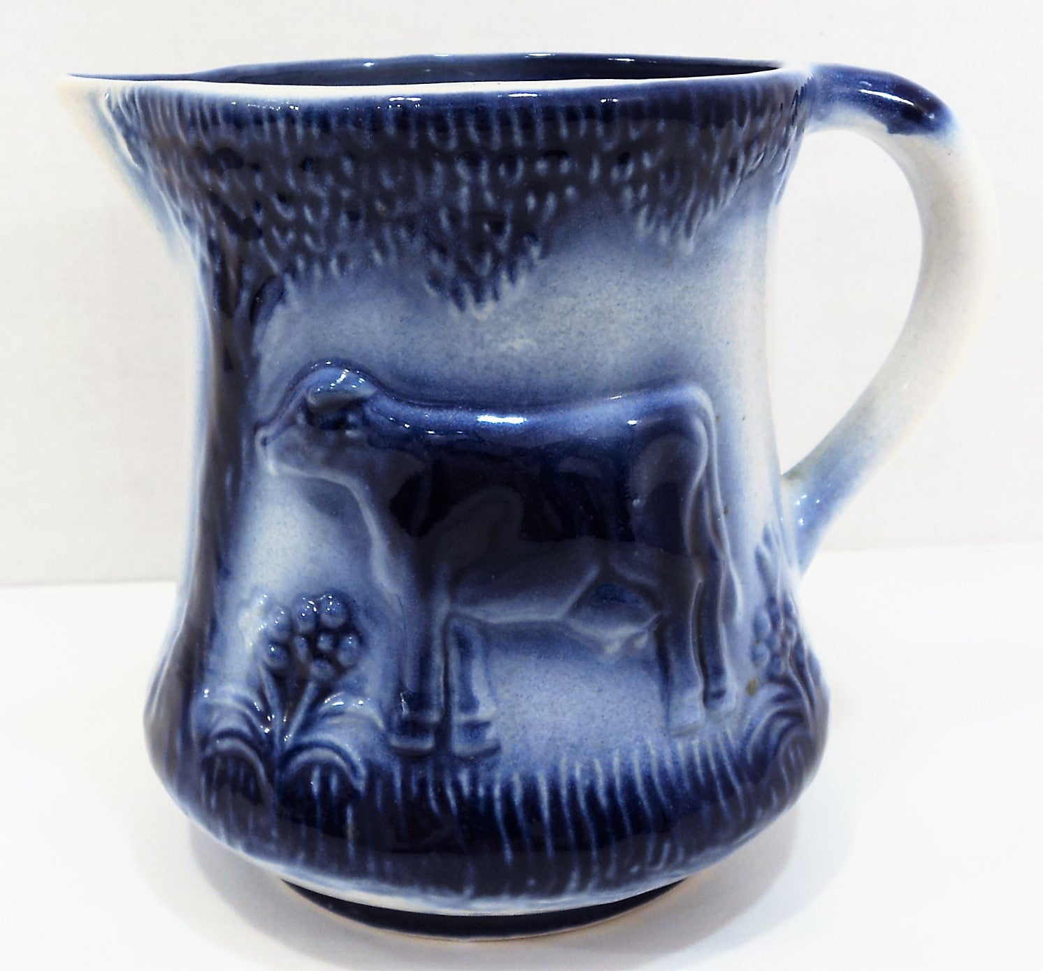 Flow Blue Pottery Pitcher