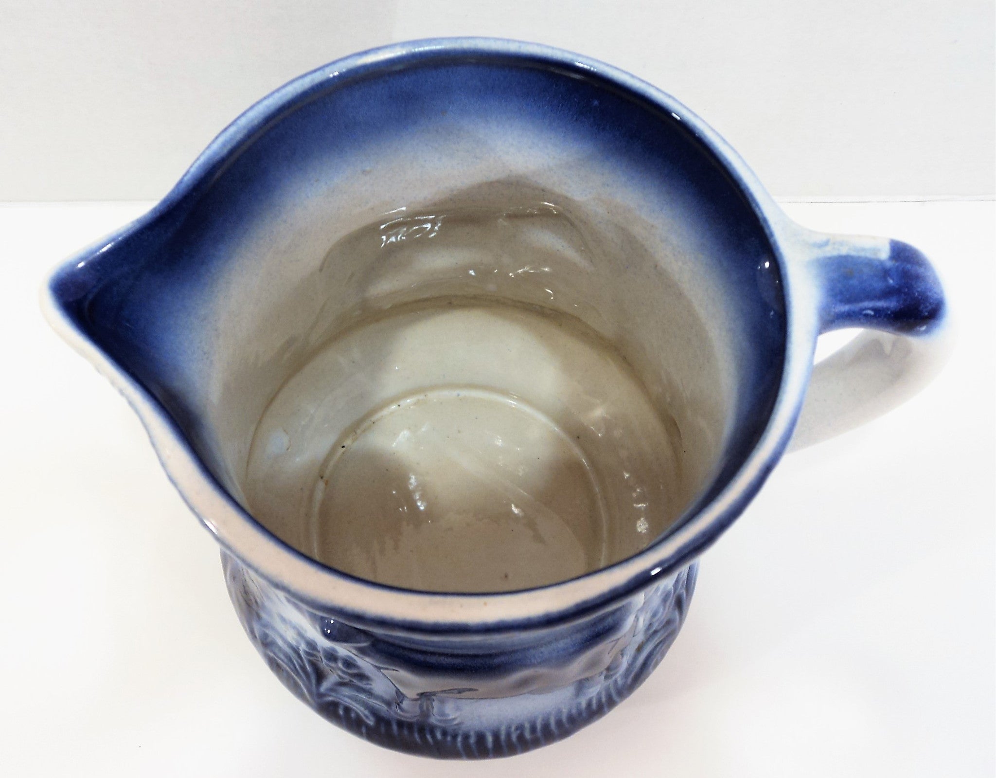 Flow Blue Pottery Pitcher