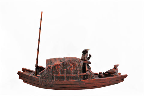 Boxwood Fisherman in a Boat